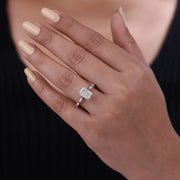 Radiant cut lab grown diamond engagement ring with marquise side stone set in prong and created in 10k gold.