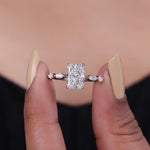 Load image into Gallery viewer, Radiant cut lab grown diamond engagement ring with marquise side stone set in prong.