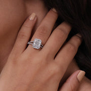 Lab grown radiant cut diamond halo engagement ring with split shank band in 14k gold.