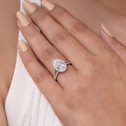 Lab grown pear shaped diamond halo engagement ring with split shank band in 10k gold
