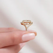 Unique bridal wedding ring with oval moissanite gemstone.