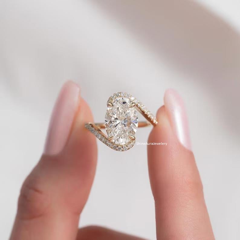 Handmade fine jewelry oval moissanite ring detail shot.