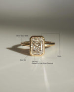 Load image into Gallery viewer, 3.00 CT Radiant Cut Lab Grown Diamond Engagement Ring IGI Certified 14K Yellow Gold Bezel Set Solitaire Ring image 2