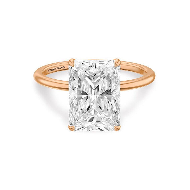 14k rose gold ring featuring radiant cut lab grown diamond solitaire engagement ring set in 4 claw prongs.