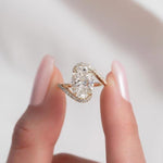 Load image into Gallery viewer, 4CT oval cut moissanite engagement ring in 14k yellow gold twisted band.