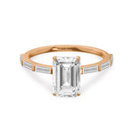 Load image into Gallery viewer, 14k rose gold ring featuring lab grown emerald cut diamond with baguette side stone.