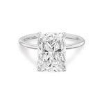 Load image into Gallery viewer, 14k white gold ring featuring radiant cut lab grown diamond solitaire engagement ring set in 4 claw prongs.