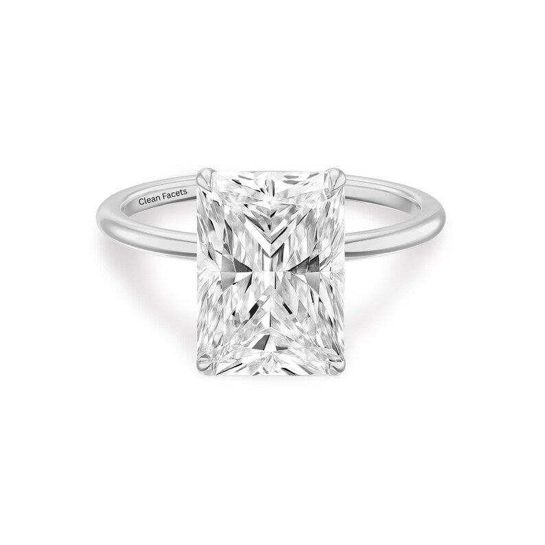 14k white gold ring featuring radiant cut lab grown diamond solitaire engagement ring set in 4 claw prongs.
