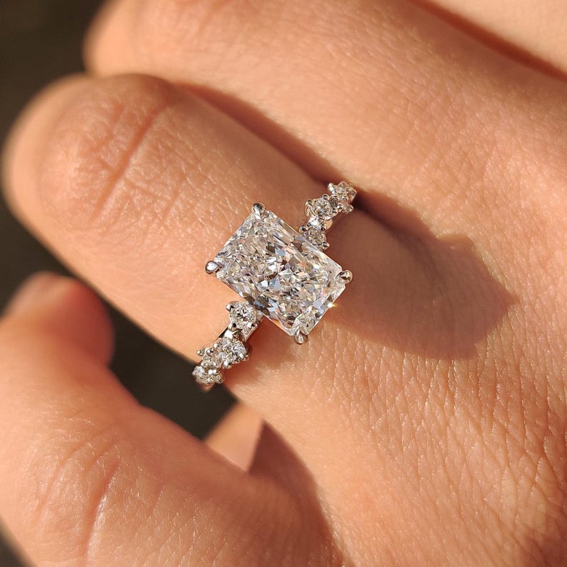 Lab grown radiant cut diamond ring with elegant hidden halo.