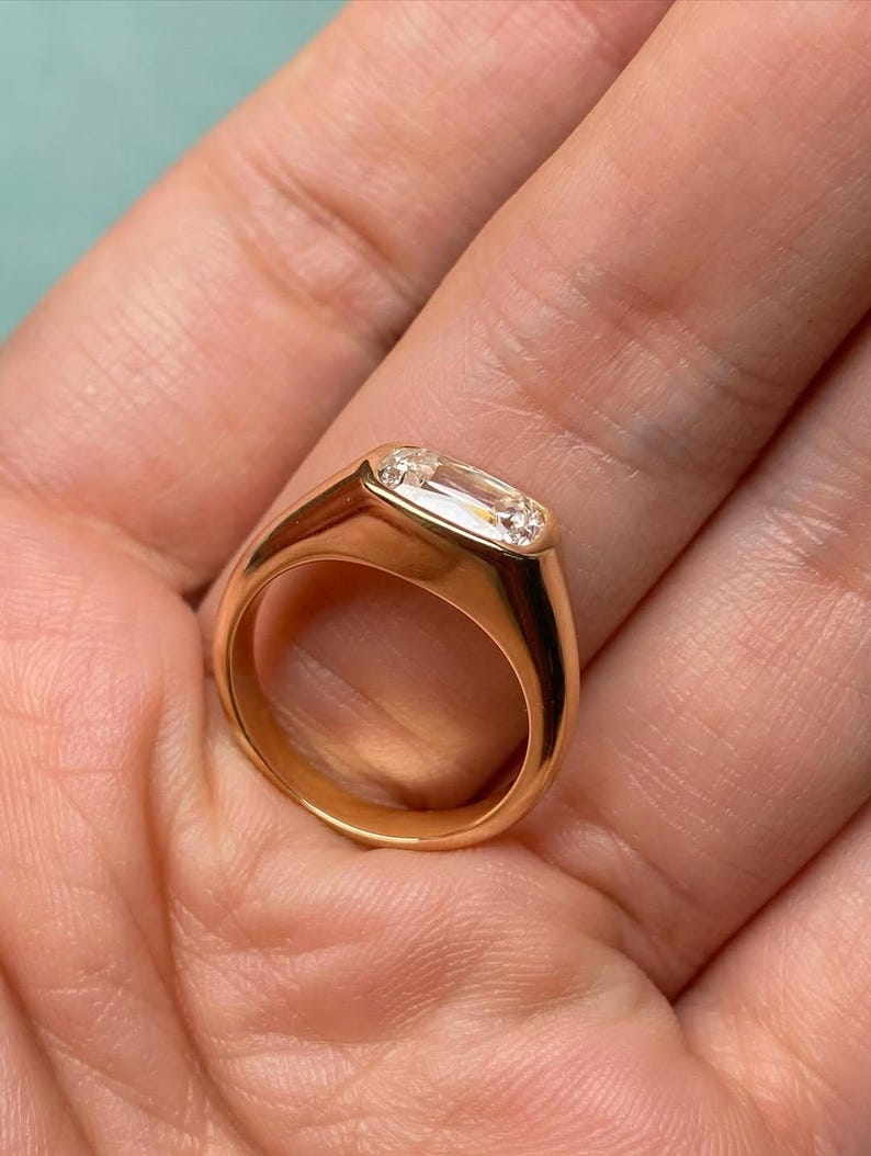cushion lab grown diamond bezel set engagement ring in yellow gold