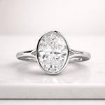 Load image into Gallery viewer, 2 Carat IGI Certified E Color VVS2 Clarity Oval Cut Lab Grown Diamond Bezel Set Solitaire Engagement Ring 14k Yellow Gold Oval Moissanite Engagement Ring bezel set solid gold, Solitaire engagement ring Diamond Wedding, Delicate Women Oval Cut Promise Anniversary 1.7 Carat IGI Certified D Color VVS2 Clarity Oval Cut Lab Grown Diamond Bezel Set Solitaire Engagement Ring 18k Yellow Gold 0.75 Carat Bezel Set Oval CVD Lab Diamond Engagement Ring, Oval Solitaire Ring With Low Yellow or Rose gold