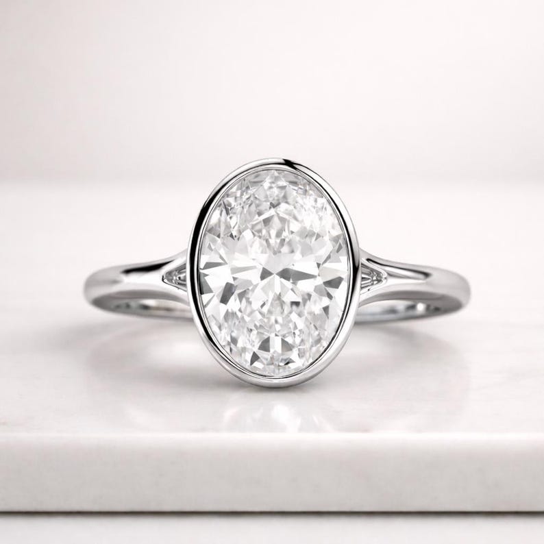 2 Carat IGI Certified E Color VVS2 Clarity Oval Cut Lab Grown Diamond Bezel Set Solitaire Engagement Ring 14k Yellow Gold Oval Moissanite Engagement Ring bezel set solid gold, Solitaire engagement ring Diamond Wedding, Delicate Women Oval Cut Promise Anniversary 1.7 Carat IGI Certified D Color VVS2 Clarity Oval Cut Lab Grown Diamond Bezel Set Solitaire Engagement Ring 18k Yellow Gold 0.75 Carat Bezel Set Oval CVD Lab Diamond Engagement Ring, Oval Solitaire Ring With Low Yellow or Rose gold