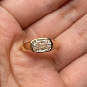 2 ct cushion lab grown diamond bezel set engagement ring in yellow gold