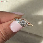 Load and play video in Gallery viewer, Lab Grown Diamond Three Stone Ring: Round Cut Yellow Gold Engagement Ring