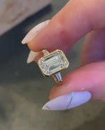Load and play video in Gallery viewer, Emerald Cut 2.50ct Lab Grown Diamond Full Bezel Engagement Ring