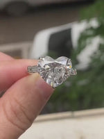 Load and play video in Gallery viewer, 2 CT Heart Cut Lab Grown Diamond Engagement Ring – Sterling Silver Three Stone Ring