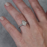 Load and play video in Gallery viewer, Pear Diamond Engagement Ring with Baguettes • Bezel Set with Trellis and Channel Set • Lab Grown Diamond
