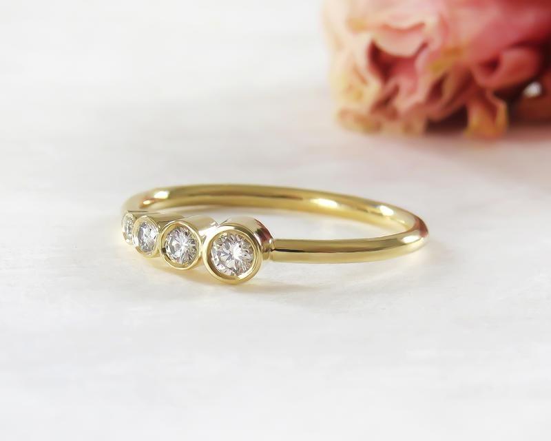 YELLOW GOLD FIVE STONE ASYMMETRIC BEZEL SET MOISSANITE DIAMOND WEDDING RING BAND