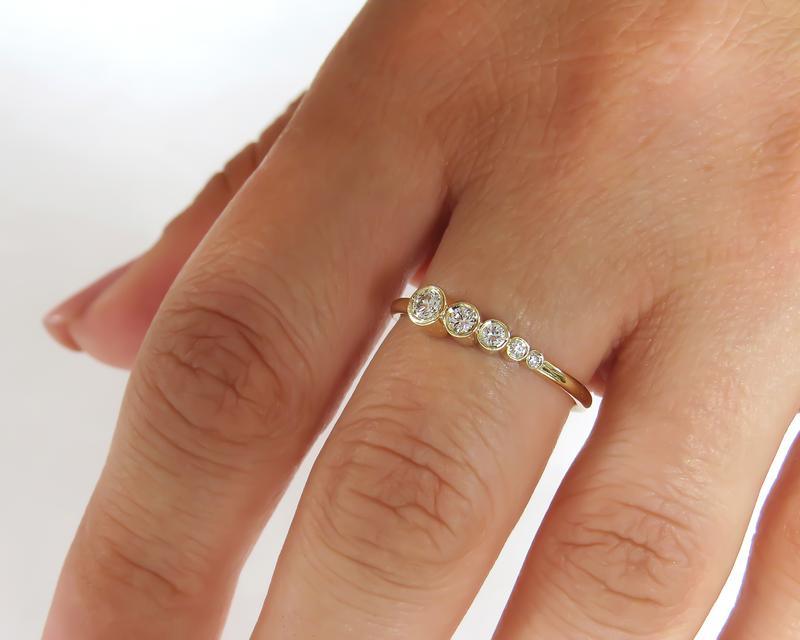 YELLOW GOLD FIVE STONE ASYMMETRIC BEZEL SET MOISSANITE DIAMOND WEDDING RING BAND